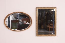 A 20th century gilt framed rectangular mirror together with a near matching oval gilt mirror.