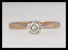 A 9ct gold hallmarked single stone diamond solitaire ring. The stone approx 25pnts.