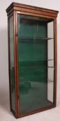 A Victorian large mahogany and glass shop display cabinet.
