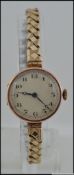 A 9ct gold hallmarked ladies wrist watch, English made with a Swiss movement,