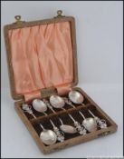 A cased set of 6 continental silver early 20th century teaspoons.