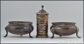 A pair of silver hallmarked table salts bearing hallmarks for Edwin Charles Purdie, London 1884.