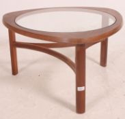 A vintage G-Plan Librenza type teak wood coffee table of circular form having inset glass top over