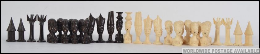 An early 20th century Ebony and Ivory chess set ( see illustrations )