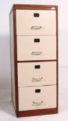A vintage mid century wooden Industrial office filing cabinet being upcycle painted complete with
