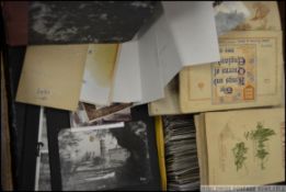 Large box of postcards (many hundreds), photos, cigarette cards and drawer of ephemera.