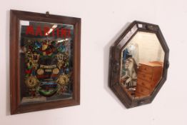 A 1920's Octagonal Jacobean revival oak wall mirror with bevelled plate mirror glass together with