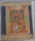 A Victorian Christmas card having upholstered card back with lace.