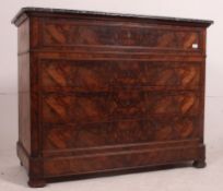A 19th century walnut and marble French commode chest of drawers.