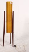 A 1950's teak and fibre glass sputnik / rocket lamp raised on angled teak supports with original