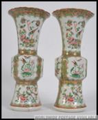 A pair of 19th century Chinese / Canton / Cantonese gu vases having famille rose foliate