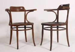 A pair of 1920's Art Deco bentwood cafe chairs with panel circle seats by Jacob and Josef Kohn