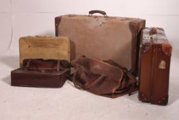A good collection of vintage suitcases to include good leather holdall, suitcases, attache,