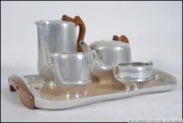 A vintage retro Picquot ware coffee service, consisting of coffee pot, tea pot, creamer,