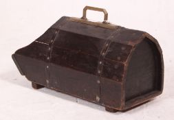 A good early 20th century ebonised oak coal scuttle applied with brass fittings and fixtures,