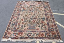 A large Persian rug with geometric design having Islamic influence having central medallion design.