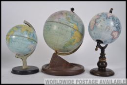 A collection of vintage 20th century desk top globes, all on plinth bases. 2 being Chad Valley.