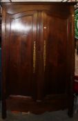 A 19th Century Victorian Provincial French Oak Double Armoire Wardrobe having decorative large