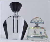 A pair ( non matching ) of Art Deco cut clear and coloured glass perfume bottles,