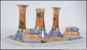 A fantastic 20th century lustre dressing table set by Noritake to include candle sticks, pots,