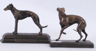 Two 20th century bronze effect painted cast iron statues of dogs - the first being a greyhound,