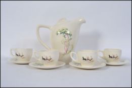 A retro Wedgwood Hyde Park tea service by Percy Lloyd comprising teapot, cups and saucers,