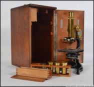 A early 20th century dating to 1912 lacquered brass scientific microscope by E. Leitz Wetzlar, No.