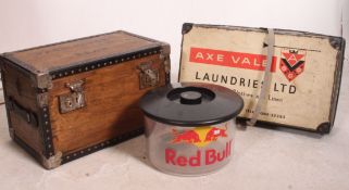 A vintage laundry basket with original notation for Axe Vale Launderies together with a wooden