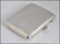 A silver hallmarked engine turned cigarette / cheroot holder bearing hallmarks for Birmingham 64.