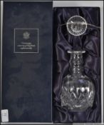 A Stuart Crystal cut glass decanter in the original presentation case complete with the stopper