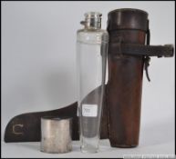A Victorian silver plated mounted cut glass campaign - saddle hunting flask in the original leather