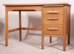 A vintage 1930's Air Ministry type oak pedestal desk having open kneehole recess with raised bank