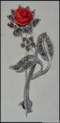 A silver and marcasite scottish style brooch set with coral