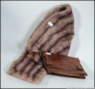 A vintage Crocodile skin ladies 1950's handbag together with a vintage mid century ladies fur stole