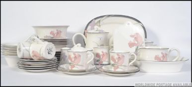 A Noritake ' Cafe De Soir ' dinner and tea service comprising 6 dinner plates, 6 side plates,