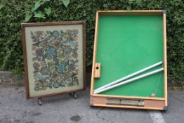 A vintage bar billiards table along with a vintage fire screen / table combo