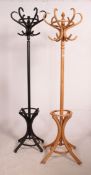 A pair of 20th century retro modern turned and bentwood hat stands in the manner of Thonet.