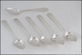 A Georgian 19th century set of 6 silver hallmarked teaspoons , London 1802 by Thomas Wallis II.