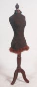 A 20th cenutry tailors / shop haberdashery dummy / dressmakers mannequin raised on tripod support.