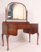 A good quality Edwardian solid mahogany Queen Anne revival dressing table.