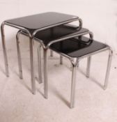 A set of 3 1970's retro black glass and chrome nest of tables.