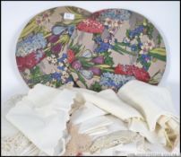 A collection of vintage early to mid 20th century table coverings and other lace items