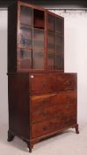 A Georgian mahogany secretaire / bureau bookcase having fall front and pull out appointed desk