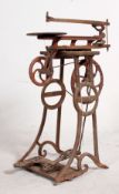 A vintage early 20th cenutry Seneca Falls Mfc Co cast iron woodworking treadle machine.