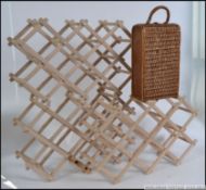 3 Vintage retro folding wine racks with a vintage wicker woven 2 bottle wine carrier and a wicker