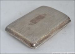 A silver hallmarked engine turned Cheroot / Cigarette case,