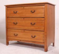 An early 20th century Edwardian pine straight three chest of drawers raised on a plinth base.