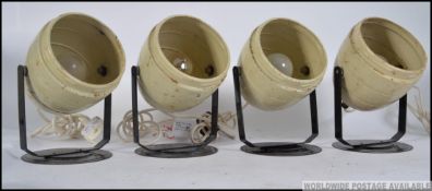A set of 4 industrial KODAK 1960's beehive dark room lamps in cream with ball finial bodies on