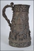 A 19th century continental bronze stein,