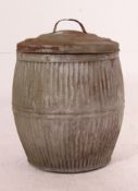 A mid century Industrial galvanised metal barrel bin complete with the lid, both with ribbed design.